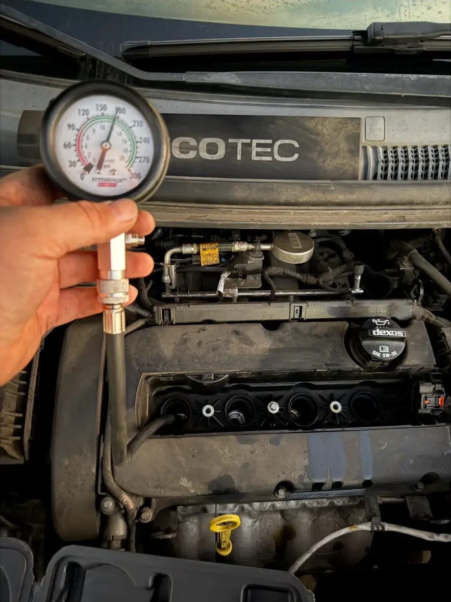 Compression test on a four cylinder engine