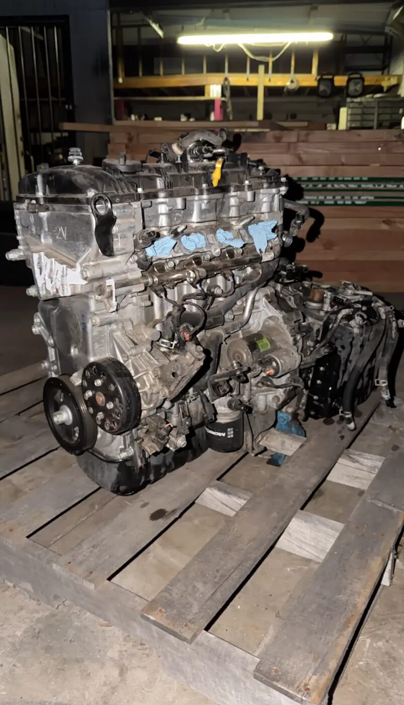 Used engine and transmission assembly on a pallet