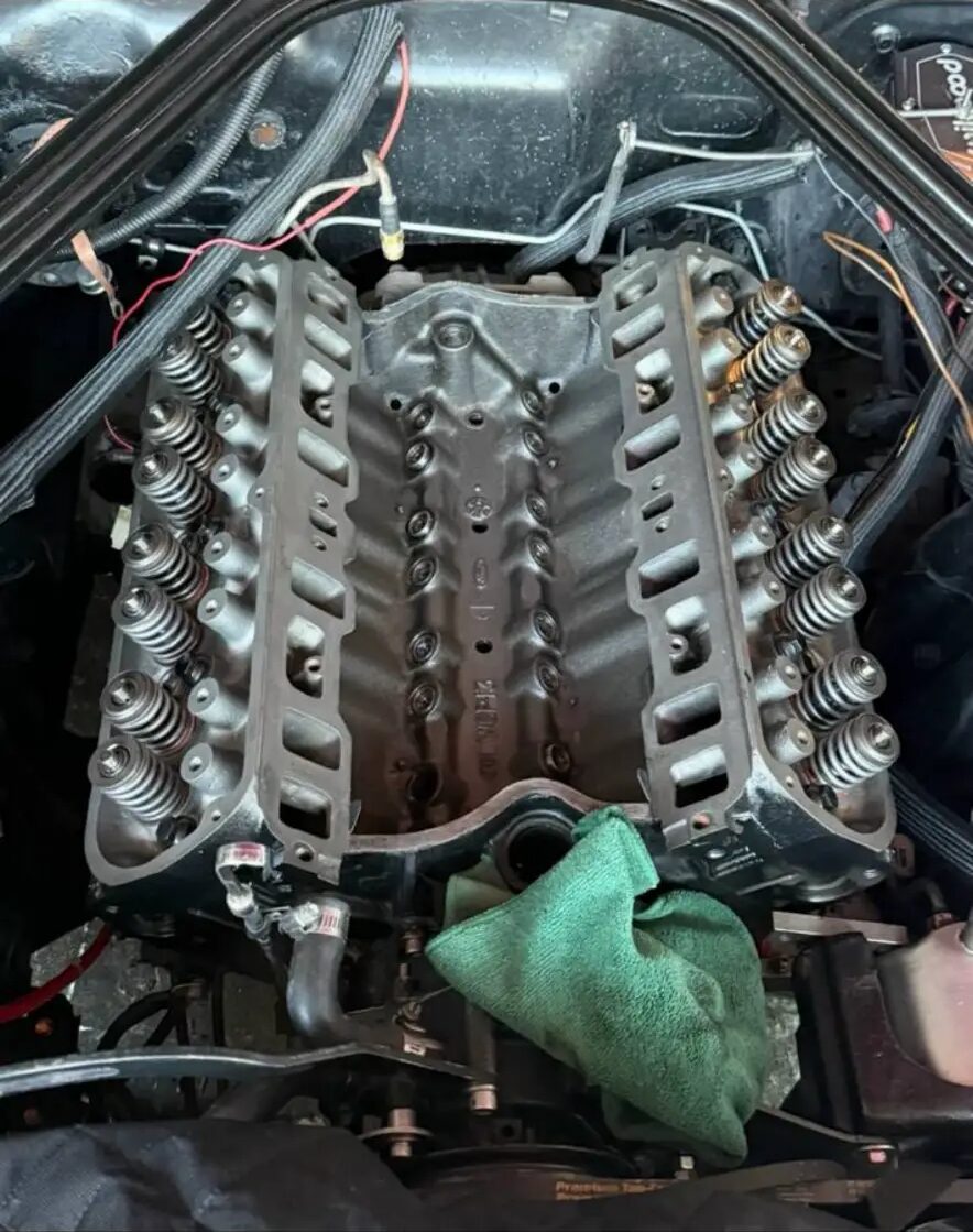 Ford V8 intake removed with heads and valvetrain exposed